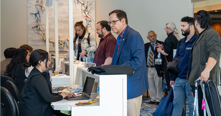 Individuals registering for conference